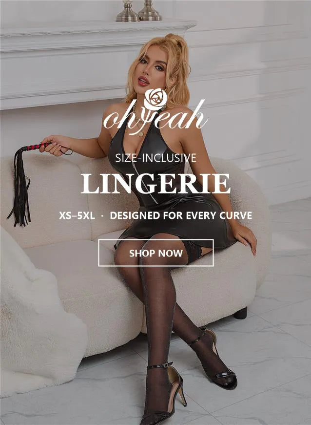 Model seated in a black faux-leather lingerie dress with lace stockings